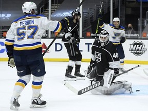 Calvin Petersen of the Los Angeles Kings reacts after a goal from David Perron of the St. Louis Blues, to tie the game 2-2, during a 3-2 Blues overtime win at Staples Center on March 05, 2021 in Los Angeles, California.