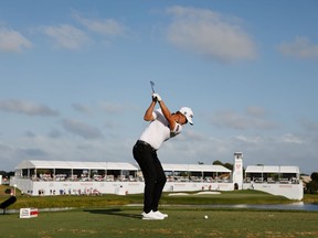 Matt Jones of Australia plays his shot from the 17th tee during the third round of The Honda Classic at PGA National Champion course on March 20, 2021 in Palm Beach Gardens, Florida.