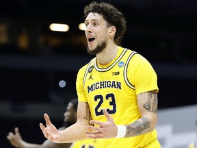 Brandon Johns Jr. of the Michigan Wolverines reacts after a foul call against the LSU Tigers in the second round game of the 2021 NCAA Men's Basketball Tournament at Lucas Oil Stadium on March 22, 2021 in Indianapolis, Indiana.