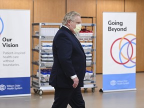 Ontario Premier Doug Ford hold a press conference after visiting the William Osler Health System - Peel Memorial Centre for Integrated Health and Wellness during the COVID-19 pandemic in Brampton on Friday, March 26, 2021.