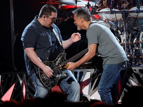 Wolfgang Van Halen (left) performs "Panama" with his father Eddie Van Halen at the 2015 Billboard Music Awards in Las Vegas, May 17, 2015