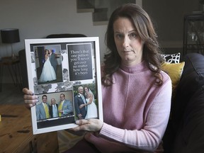 Pam Prsa's father Robert Trudell was the first person to be hospitalized with COVID-19 in Windsor-Essex, and one of the first people to die from the virus. Prsa poses with a collage of photos commemorating her father on March 6, 2021, at her Tecumseh home.