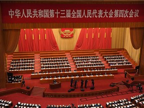 This general view shows the opening session of the National People's Congress (NPC) at the Great Hall of the People in Beijing on March 5, 2021.