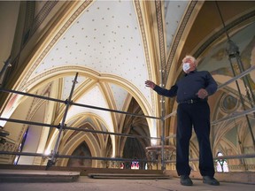 "Symbol of confidence and hope." Paul Mullins is shown inside Assumption Church in Windsor on Thursday, March 4, 2021. The renovation project has reached a new milestone as restoration work on a section of the ceiling has been finished.