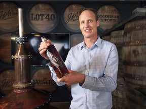 Don Livermore, master blender with Hiram Walker and Sons Limited in Windsor displays a bottle of Lot 40 Dark Oak rye on Friday, March 26, 2021. The locally produced spirit was named the world's best rye at the World Whisky Awards.