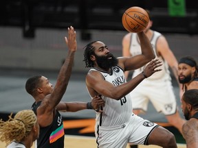 Brooklyn Nets guard James Harden shoots in the second half against the San Antonio Spurs at the AT&T Center.