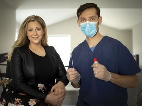 Barbara Szeman and Adrian Jaworski, who have set up a company that tests people for COVID-19 in the film industry, are pictured in their home in Comber on Tuesday, March 16, 2021.