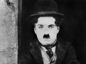 This file photo taken in 1921 shows the late Charles Spencer Chaplin (1889-1977), better known as Charlie Chaplin, performing in the role of "Charlie" in the famous motion picture called "the Kid" for the "First National", in Hollywood California.