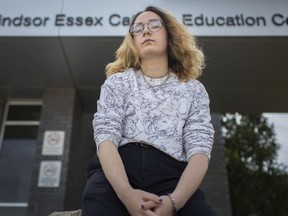 Damien Crowe, a transgender man, pictured outside the Windsor Essex Catholic Education Centre on Tuesday, March 30, 2021, has petitioned the Windsor-Essex Catholic District School Board, asking that he be allowed to graduate with his chosen name on his diploma.
