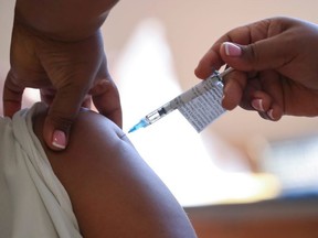 A healthcare worker receives the Johnson and Johnson coronavirus disease (COVID-19) vaccination at Khayelitsha Hospital near Cape Town, South Africa, February 17, 2021.