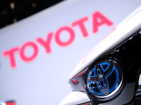 FILE PHOTO: The Toyota logo is seen on a Corolla model at the 89th Geneva International Motor Show in Geneva, Switzerland March 5, 2019.