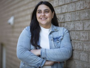 Samantha Dalo, lead research associate for the local scenario project for Workforce WindsorEssex, is pictured outside her home on Monday.