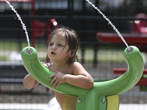 In this file photo from July 2020, Zain Charara, 3, has some fun at the Realtor Park splash pad.