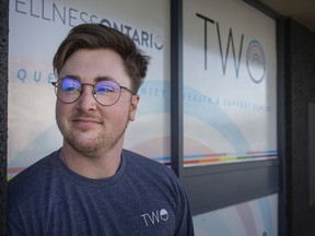 Alex Reid, executive director of Trans Wellness Ontario - formerly W.E. Trans Support - outside the community agency's renovated offices in Windsor on March 31, 2021.