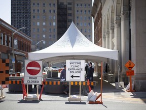 WINDSOR, ONTARIO:. MARCH 19, 2021 - Tents are set up outside the COVID-19 vaccination centre at the University of Windsor's Windsor Hall, pictured on Friday, March 19, 2021.