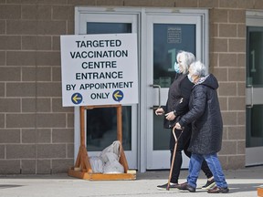Visitors to the COVID-19 vaccination clinic at the WFCU Centre in Windsor on March 9, 2021.