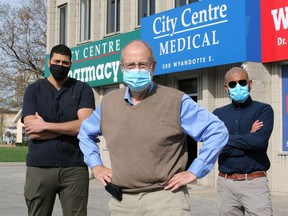 Dr. Tony Hammer, centre, Dr. Tariq Elsayegh and Dr. Sean Prabhu, right, prepare for Windsor's first weekend addictions clinic at The City Centre Clinic on Wyandotte Street East, Saturday April 10, 2021.