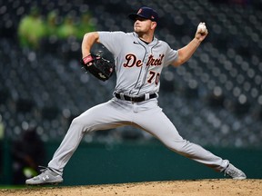 Tyler Alexander of the Detroit Tigers delivers a pitch in the eighth inning during a game against the Cleveland Indians at Progressive Field on April 10, 2021 in Cleveland, Ohio.