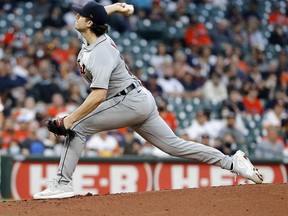 Casey Mize of the Detroit Tigers pitches in the first inning against the Houston Astros at Minute Maid Park on April 12, 2021 in Houston, Texas.