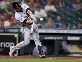 Wilson Ramos of the Detroit Tigers hits a two-run home run in the fifth inning against the Houston Astros at Minute Maid Park on April 13, 2021 in Houston, Texas.