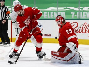 Thomas Greiss of the Detroit Red Wings blocks a shot on goal against the Dallas Stars in the second period at American Airlines Center on April 19, 2021 in Dallas, Texas.
