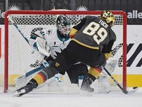 Alex Tuch of the Vegas Golden Knights scores a goal during a shootout against Martin Jones of the San Jose Sharks at T-Mobile Arena on April 19, 2021 in Las Vegas, Nevada. The Golden Knights defeated the Sharks 3-2 in a shootout.