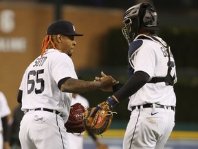 Gregory Soto of the Detroit Tigers celebrates a 5-2 win over the Pittsburgh Pirates with Grayson Greiner after the second game of a double header at Comerica Park on April 21, 2021 in Detroit, Michigan.