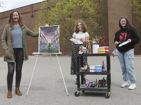 Sanja Srdanov, left, an art teacher at Sandwich Secondary School in LaSalle, is shown with Elle Reid, centre and Kennedy Fremlin on Monday, April 19, 2021. They recently participated in a virtual art exhibit.