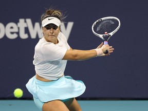 Bianca Andreescu of Canada hits a backhand against Maria Sakkari of Greece in a women's singles semifinal in the Miami Open at Hard Rock Stadium on Thursday.