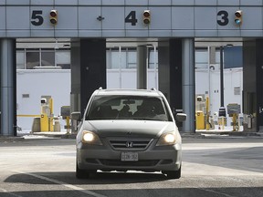 A motorist enters Windsor, Ont. via the Windsor/Detroit tunnel on Tuesday, Feb. 9, 2021.