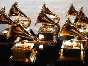 In this file photo taken on Jan. 28, 2018, Grammy trophies sit in the press room during the 60th Annual Grammy Awards in New York.