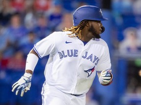 Toronto Blue Jays designated hitter Vladimir Guerrero Jr. runs after hitting an RBI single against the Los Angeles Angels on April 10, 2021, at TD Ballpark in Dunedin, Fla.