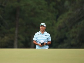 Hideki Matsuyama of Japan walks to the 18th green during the third round of the Masters at Augusta National Golf Club on April 10, 2021 in Augusta, Ga.