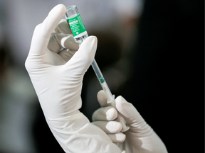 A health official draws a dose of AstraZeneca's COVID-19 vaccine manufactured by the Serum Institute of India, at Infectious Diseases Hospital in Colombo, Sri Lanka January 29, 2021.
