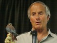 In this Jan. 24, 2008 file photo, naturalist Jack Hanna describes the sparrow hawk, at left, during a presentation at the University of Manitoba in Winnipeg.