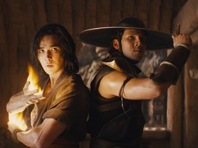 Ludi Lin as Liu Kang and Max Huang as Kung Lao in Mortal Kombat.