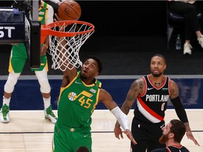 Utah Jazz guard Donovan Mitchell goes to the basket during the third quarter against the Portland Trail Blazers at Vivint Smart Home Arena.