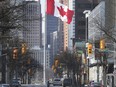 Downtown Windsor, Ontario, foreground with Detroit, Michigan in the background is shown on Saturday, April 3, 2021.