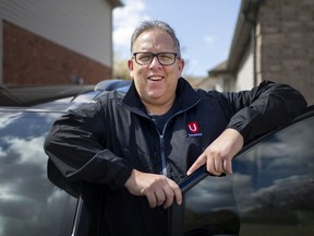 Dave Cassidy, who was just acclaimed as president of Unifor Local 444 for another three years, is pictured with his Chrysler Pacifica outside his home in Essex on Thursday, April 22, 2021.