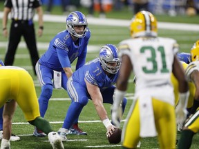 Detroit Lions quarterback Matthew Stafford waits for the snap from center Frank Ragnow during the second quarter against the Green Bay Packers at Ford Field.