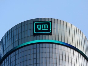 FILE PHOTO: The new GM logo is seen on the facade of the General Motors headquarters in Detroit, Michigan, U.S., March 16, 2021. Picture taken March 16, 2021.