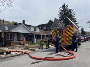 Windsor Fire and Rescue Services crews tackle a duplex fire in the 1600 block of Goyeau Street on Friday, April 23, 2021.