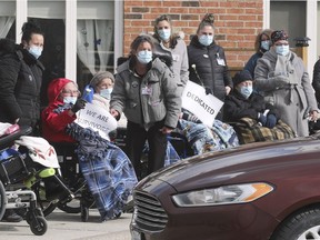 Staff and residents at the Heron Terrace long-term care residence in Windsor participated in a drive-by celebration of their pandemic efforts on a chilly Thursday, April 1, 2021.