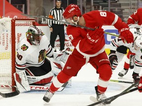 Chicago Blackhawks goaltender Malcolm Subban makes the save on Detroit Red Wings center Sam Gagner in the second period at Little Caesars Arena.