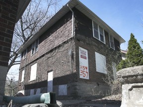 A boarded up house at 357-359 Indian Road in Windsor is shown on Friday, April 9, 2021. The new owners of the building are applying to the city to demolish it and replace it with a new building designed to look like the house did in 1958.