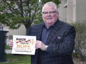 Rob Agnew is shown on Monday, April 26, 2021, near his Tecumseh residence. The Manor Realty agent is promoting the company's Keys of Hope charity efforts.