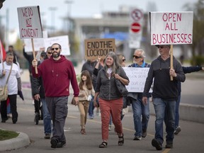 More than 100 people gathered in downtown Windsor on Saturday, April 17, 2021, to protest COVID-19 restrictions.