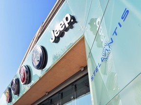 FILE PHOTO: The logo of Stellantis is seen at the main entrance of the FCA Mirafiori plant in Turin, Italy, January 18, 2021.