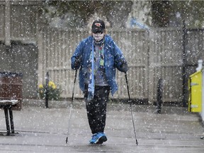Rosemary Jull was not going to let snow flurries stop her from her daily walk on Tuesday, April 20, 2021 at  Reaume Park in Windsor.