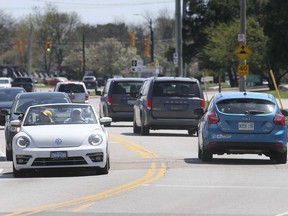 Motorists travel over a speed bump on Riverside Drive East near the Windsor Yacht Club on Tuesday, April 13, 2021. Mayor Drew Dilkens is suggesting traffic calming measures instead of reduced speed limits.